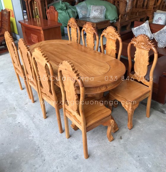 Bàn ăn gỗ gõ đỏ 8 ghế - mẫu ô van ghế vách liền 